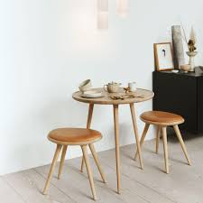 Whether you want a place to display books or just put your feet up, a mid century modern coffee table helps tie pieces together. Mater Accent Coffee Table O 70cm Ambientedirect