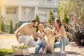 42 видео 64 297 просмотров обновлен 12 февр. Good Life Cute Family Stroking Their Dog And Looking Happy Stock Photo Picture And Royalty Free Image Image 153475755