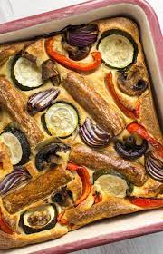 Try our easy to follow sausage & vegetable toad in the hole recipe. Vegetable Toad In The Hole Vegetarian Sausages And Roasted Veggies All Cooked In A Yorkshire Pudding Batter Vegetarian Sausages Veggie Sausage Tea Time Food