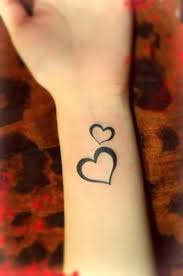 Google Image Result For Http Www Fashionshost Com Wp Content Uploads 2013 04 Two Heart Tattoo On Wr Heart Tattoo Wrist Two Hearts Tattoo Heart Tattoo Designs