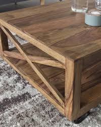Wohnling Couchtisch Pali Mit Rader 110 Cm Wl1 387 Aus Sheesham Massivholz Und Metall Wohnzimmer Fe Couchtisch Massivholz Holztisch Modern Sheesham Couchtisch