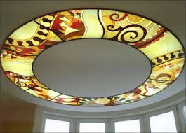 A glass transom is located above a frameless glass shower door. Installing Stained Glass Panels In False Ceiling Designs Houzz