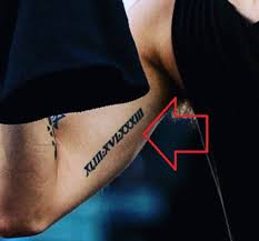 Dun's x tattoo was inked behind his right ear. Tyler Joseph S 9 Tattoos Their Meanings Body Art Guru