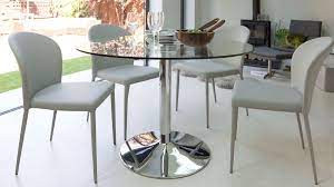 We also offer a large range of dining tables made from a variety of materials such as pine, mahogany, oak and more. Round Glass Dining Tablet For A Higher Level Lifestyle Round Dining Table Sets Glass Round Dining Table Glass Dining Table Set
