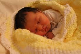 Has a couple pacifers she will come with, blanket and a fake milk bottle that is sealed. Cute Baby Girl With Brown Hair And Brown Eyes Novocom Top
