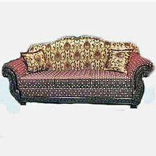 Made for lounging, this oversized rolled arm fabric sectional features deep seating & a tall padded front rail. Furniture Depot Calgary