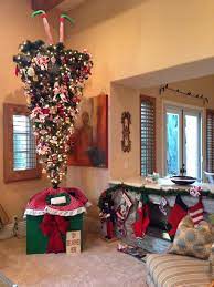 Christmas tree skirts and christmas tree collars go around the base of your tree provide a decorative backdrop for gifts. Diy Upside Down Christmas Tree Ideas To Try Just Crafting Around