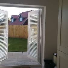 French doors are often a feature of period properties built long before we recognised the benefits of effective insulation. Patio Door French Door Shutters The Great Shutter Co