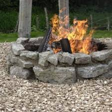 The Most Popular Rocks For Fire Pits Ehow Com Fire Pit With Rocks Backyard Fire Rustic Fire Pits
