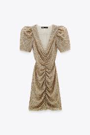 Blusen mit pailletten jetzt online bei p&c. Robe A Paillettes Zara Comment Porter Le Dore Sans Faire Bling Elle