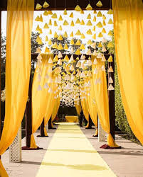 Use elaborate masks and beaded necklaces in your décor, and go for a purple, green, and gold color scheme. 31 Most Amazing Entrance Decor Ideas For Wedding Functions