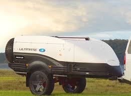 nexus off road camper fends off unfriendly terrain laser projects movies at camp off road camper motorcycle camping gear camping trailer