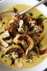 Nyt Cooking The Color Of Sunflowers This Gently Spiced Soup Comes From Yasmin Khan S Za Roasted Cauliflower Soup Recipe Roasted Cauliflower Soup Nyt Cooking