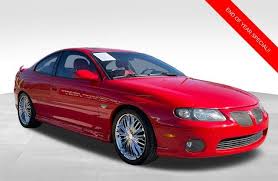 Image result for Medium Red 2004 Pontiac