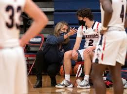 Linda Martindale wins first game as L-S boys basketball head coach