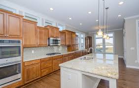 Gourmet Kitchen Radford Maple Saddle Perimeter Cabinets Landen Maple Painted Antique White Island Cabinet Maple Kitchen Cabinets Kitchen Plans Maple Kitchen