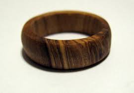 It's not a completely necessary step since the natural oils on your hands will coat it over time, but a good oil coating can cool your ring quickly. Diy Wooden Ring Wooden Rings Wooden Diy Wooden