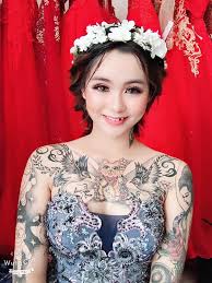 Những hình xăm mèo chiêu tài đã được rất nhiều người quan tâm và yêu thích đặc biệt là các bạn trẻ. Co Dau Máº·c Vay CÆ°á»›i Gay Sá»'t Vá»›i Hinh XÄƒm Doraemon Tren Canh Tay Va Meo Tháº§n Tai á»Ÿ Ngá»±c