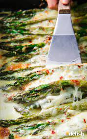 Cheesy Baked Asparagus Is The Side That Becomes Your Main Recipe Side Dishes For Salmon Side Dish Recipes Easy Side Dishes For Ribs