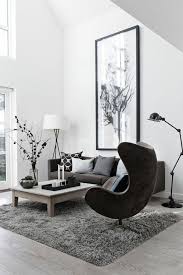 Le Fauteuil Club Ikea Pour Le Salon Avec Un Tapis Gris Et Sol En Parquette Gris Livingroom Deco Salon Deco Maison Deco