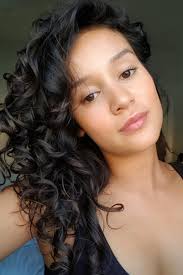 Photo of pretty dark skin wavy business lady holding full length photo of positive afro american girl worker work on her netbook read document information sit. How The Curly Girl Method Transformed One Vogue Staffer S Hair British Vogue