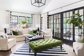 A white sofa matching the wall and floors sets the stage for cream vintage joe colombo chairs that flank a custom marmoreal coffee table. Living Room Design Ideas For Any Budget Hgtv