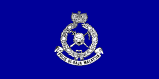 Lion's head credited to 'book of traceable heraldic art'. Royal Malaysian Police Malaysia