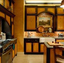 Black And Burnt Sienna Kitchen Cabinets With Distressed Finish And Stenciling By The Valley Craftsm Distressed Cabinets Kitchen Style Black Distressed Cabinets