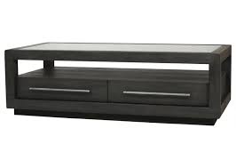 Richly stained wood in a classic rectangular shape forms the base of the gatsby coffee table, supporting an inset travertine top. Gatsby Coffee Table Morel Acacia Urban Barn