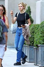 13 things to know about our style crush, nicola peltz. Nicola Peltz Wears A Black Crop Top And Jeans While Out For Some Shopping With Her Mother In New York City 240620 2