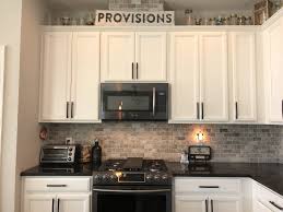 Backsplash Black And White Granite Countertops Kitchen Close Up Of The Stone Back Splash Purhcased From Lowes Black Samsung Black Appliances Kitchen Black Granite Countertops Replacing Kitchen Countertops