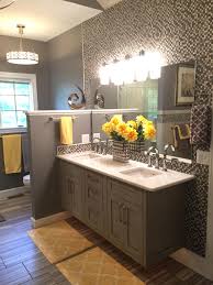 It is the one bathroom down the grey went with the wall color and the pops of yellow are so fun and cheerful! Gray And Yellow Bathroom Ideas Houzz