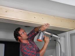 How To Wrap A Ceiling Girder With Wood Basement Remodeling Faux Beams Faux Wood Beams