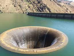 The glory hole spillway at Lake Berryessa, near Napa Valley in California.  The spillway is 72 feet in diameter, and the Monticello Dam is 304 feet  high. : rsubmechanophobia