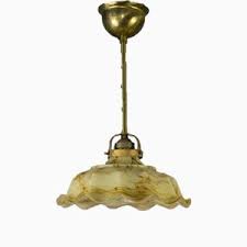 This cast metal flushmount ceiling light fixture is unsigned but presumed to have been made in the united states in circa 1935 in the period art deco style. Buy Art Deco Ceiling Lamps Pendants At Pamono