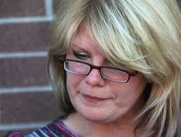 News: Kristine Bunch ; Greensburg, IN, USA; Kristine Bunch, 38, stands  outside the Decatur County