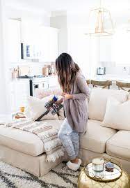 6 Things You Need When You Move Into A New House Haute Off The Rack Cream Couch Living Room Kitchen Decor Apartment Living Room Light Fixtures