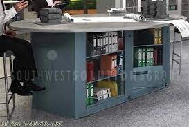 Chairs have faux leather seats. Dual Sided Spinning Rotary Supply Storage Cabinets Work Desk Countertop Height