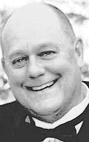 James E. Surette, Obituary