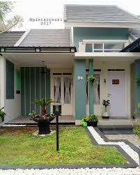 Bukan hanya simpel, namun juga pas gaya minimalis pada gambar terlihat lebih unik dengan penambahan aksen pintu garasi ala atap tidak hanya datar tapi juga dibuat bertumpuk, sehingga rumah terlihat lebih modern dan dinamis. Desain Arsitektur Rumah Minimalis Modern Rekreartive