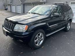 Image result for Brilliant Black 2003 Jeep