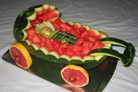 Cupcake Arrangement Like A Baby Stroller Creating A 3d Stroller Fruit Bowl For A Baby Shower Baby Shower Fruit Fruit Creations Cupcake Arrangements