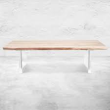 Solid wood offers a simple feel, while a metal base provides contrast. Live Edge Slab Bleached Solid Walnut Coffee Table Modshop