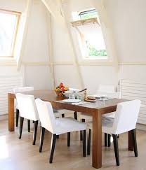 These streamlined seats with lean lines aren't overwhelming and tuck neatly under the table. White Dining Room Chairs Decoration Eatwell101