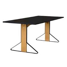 It's made from solid wood, with a circular surface set on four flared, tapered legs. Eddie Elmes Wooden Dining Table With Metal Legs Ukzn Mail System Amazon In Metal Dining Tables Kitchen Dining Room Furniture Furniture Get The Best Deals On Metal Dining Tables