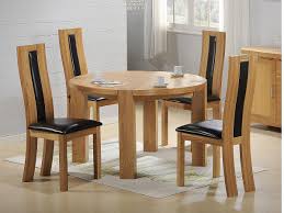 Round dining table with four chairs. Solid Wooden Round Dining Table And 4 Chairs Oak Homegenies