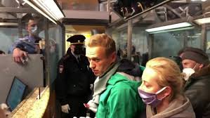 Alexei navalny, one of russia's most outspoken kremlin critics, was detained at a moscow airport sunday after returning to his home country for the first time since he nearly died after being poisoned. Rtydtgeqblg9em