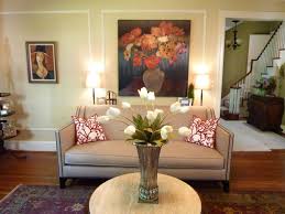 Put a corner to good use and balance the room's vertical openings with a tall cabinet. Inspirational Living Room Ideas Living Room Design Flower Centerpieces For Living Room Tables