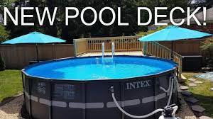 Intex pool above ground pool decorating ideas. Intex Above Ground Pool New Pool Deck Pool Ladder And Patio Umbrellas Youtube