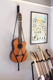 Macramé inspired a young jenny lemons i first got into macrame when i was a teenager in the early 2000s. Macrame Acoustic Guitar Stand Wall Decor Wall Mount 100 Etsy Macrame Wall Hanging Diy Guitar Stand Wall Guitar Stand